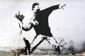 Banksy Graffiti Art On West Bank Barrier